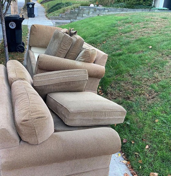Old couches set out for furniture removal